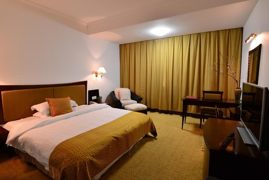 Baodao Exhibition Center Hotel Wu-i-šan Pokoj fotografie
